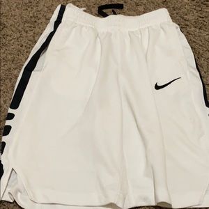 white elite shorts.